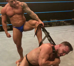 Jake puts Dom Knight into a sleeper at Thunders Arena Wrestling. 