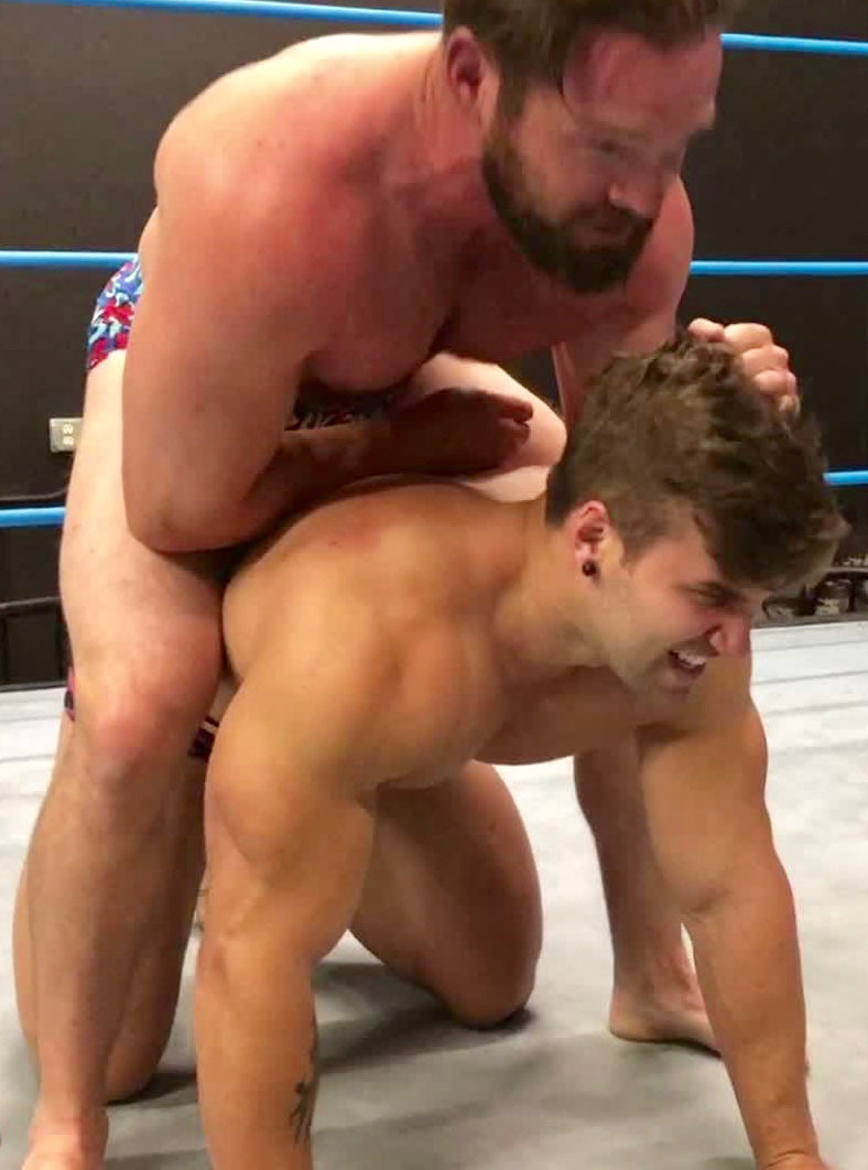 Joey King bearhugs Loki at Thunders Arena Wrestling. 