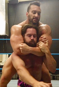 Stallion puts Joey King into a sleeper at Thunders Arena Wrestling.