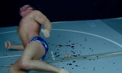 Joey King in agony on the mat in Thunders Arena