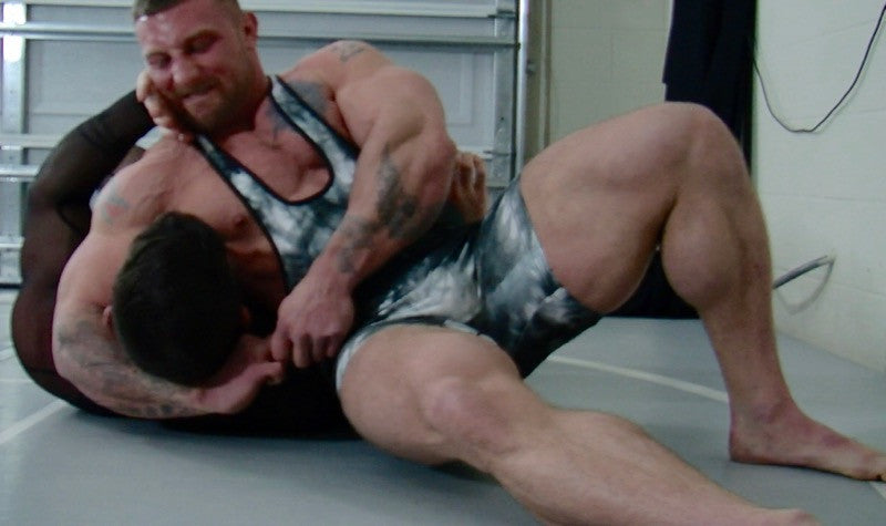 Tank with a side headlock to Marco in Thunders Arena