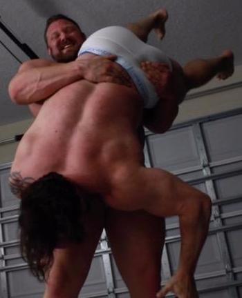 The Mountain CJS Slam Upside Down Bear Hug 