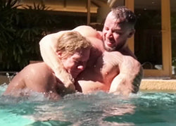 Dom9 side headlocks Lion in the pool