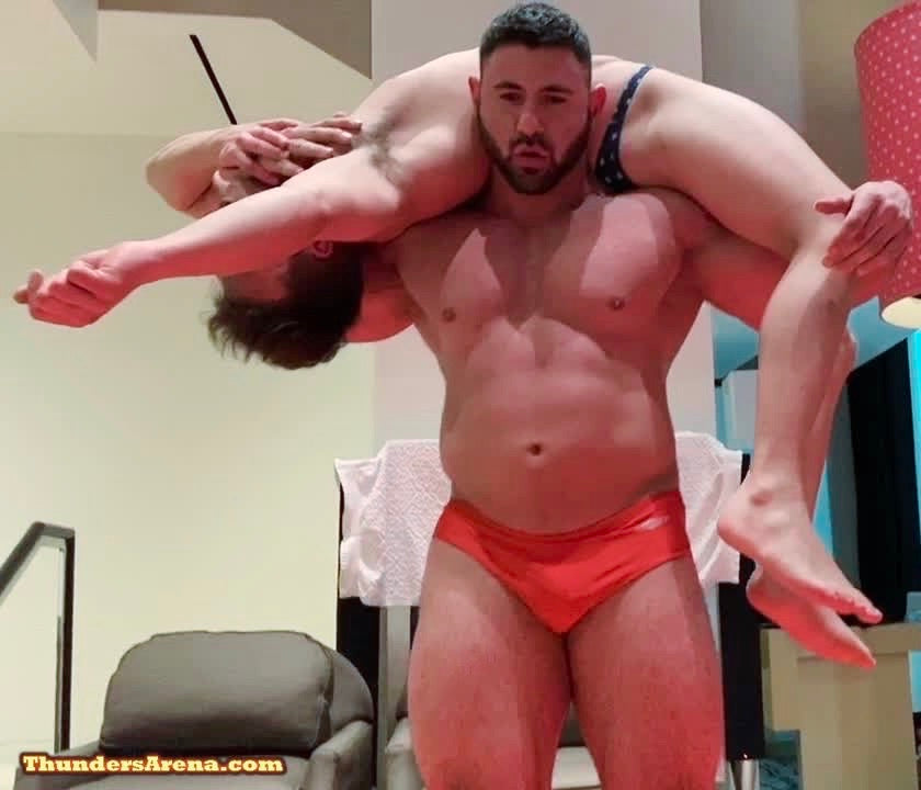 Gino puts KaSee into a fireman’s carry at Thunders Arena Wrestling. 