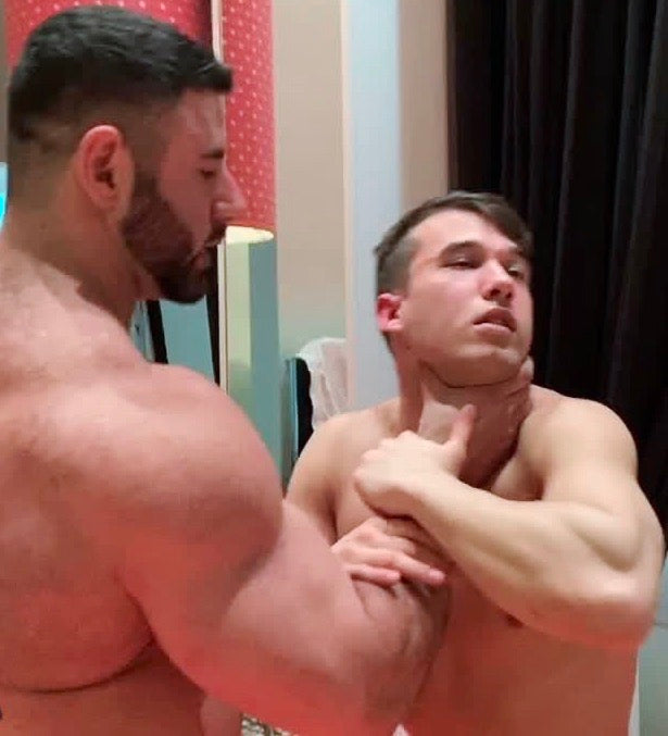 Gino choke lifts KaSee at Thunders Arena Wrestling. 