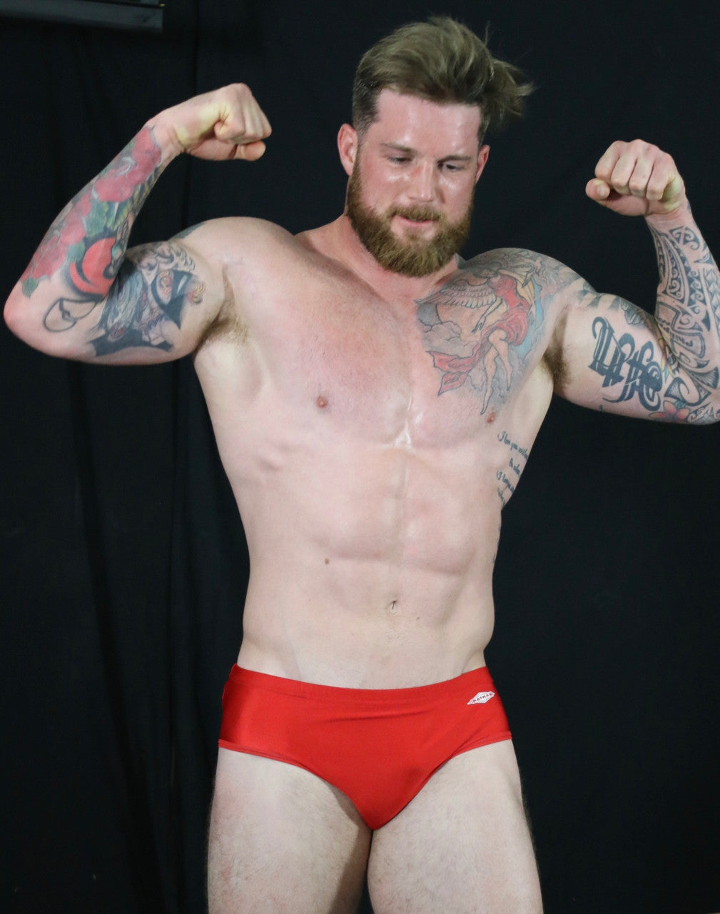 Viking abs Biceps Posing