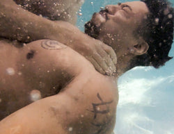 Bodybuilder getting choked underwater