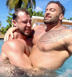 Dom9 bear hugging Stallion in the pool