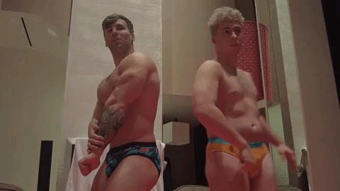 Loki and Axel flexing side by side