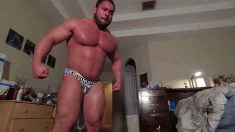 Reggie double bicep flexing